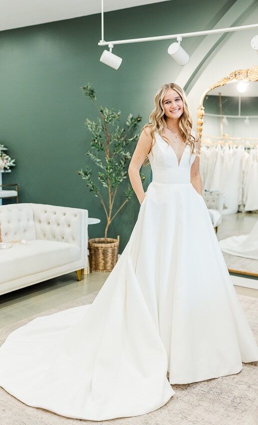 Model wearing an a-line deress