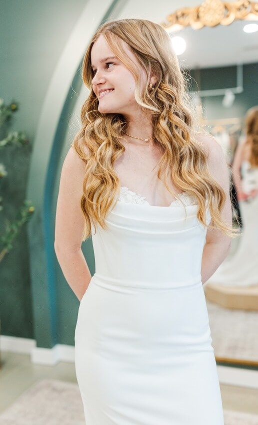 Model wearing a fitted deress