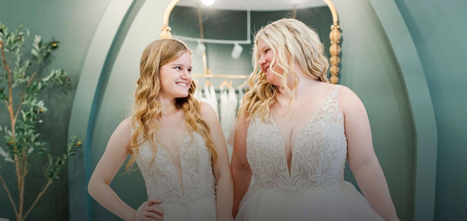 Models wearing a white dresses