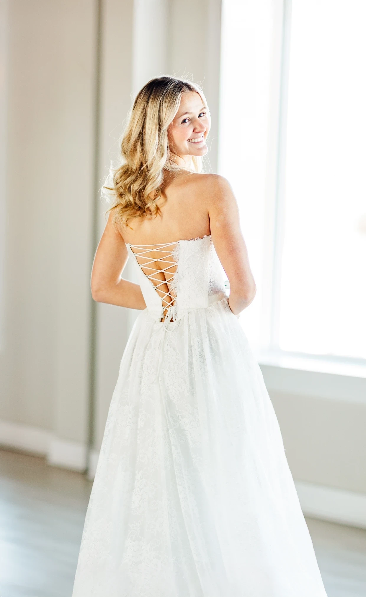 Model wearing a corset deress